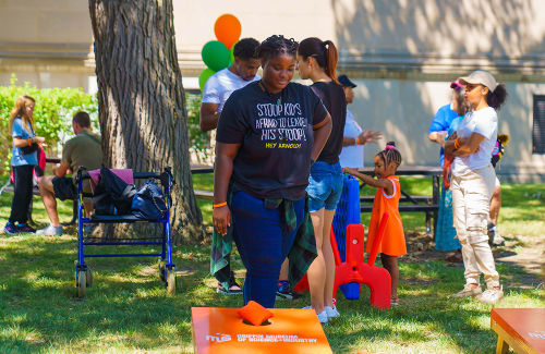 Group playing games at a Griffin MSI outdoor event